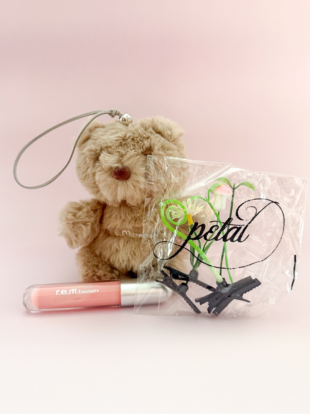 Ariana Grande Official Tour Bear with REM Cosmo lipgloss.